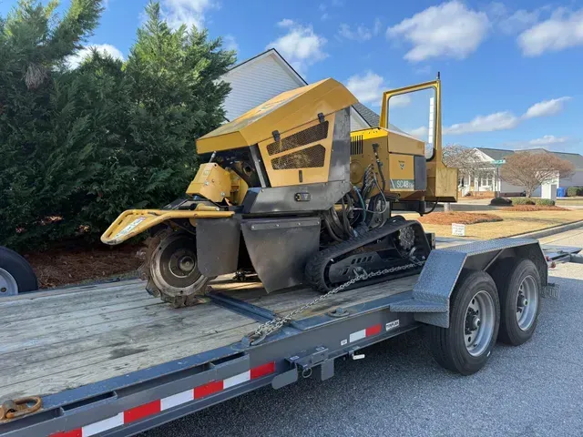 Stump grinder working on a tree stump in Eastern NC